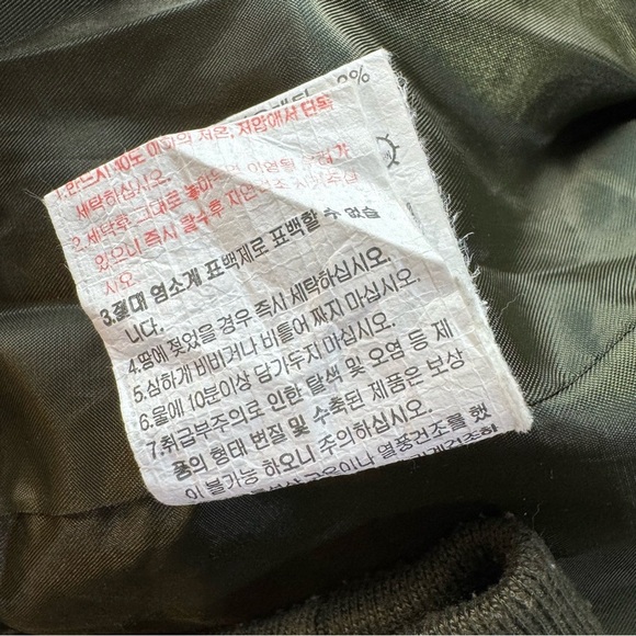 Green Raincoat with Stand-Up Collar and Zipper Closure - Picture 10 of 13